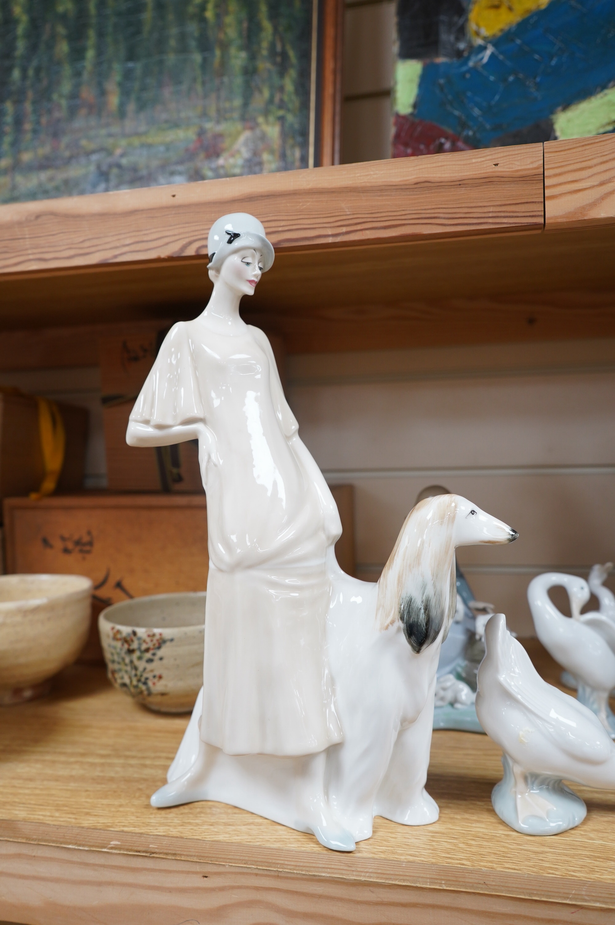 A Royal Doulton figure ‘Promenade’ HN3072, and a group of eight Lladro/Nao figures, largest 33cm high. Condition - good